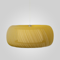 Suspension BONIE allumée effet lumineux diffusé, créant une ambiance tamisée et chaleureuse dans la pièce.